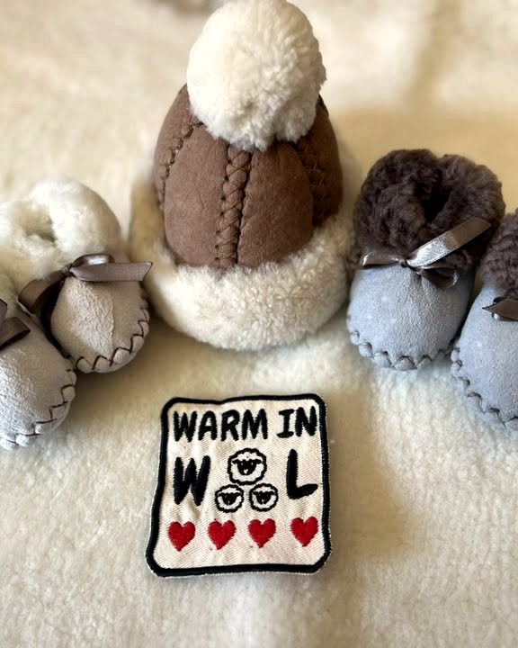 Baby slippers and a beanie